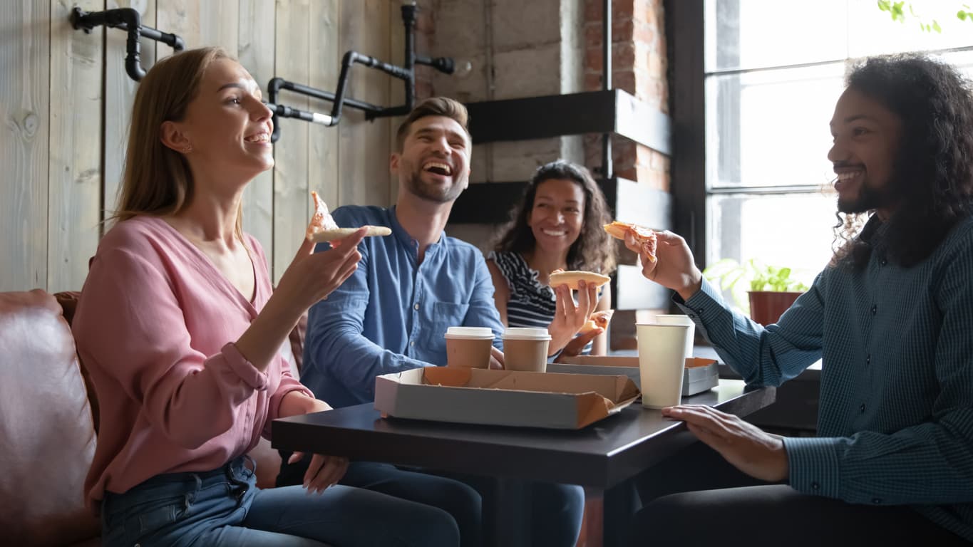 Customers eating at a fast casual restaurant